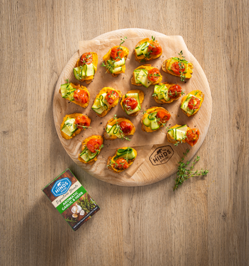 Aromatic Garlic & Herb Bruschetta with Carrot Hummus, Tomato and Pickled Courgette