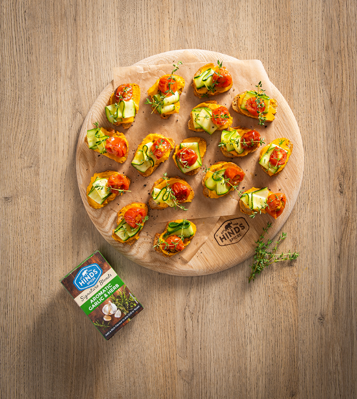 Aromatic Garlic & Herb Bruschetta with Carrot Hummus, Tomato and Pickled Courgette