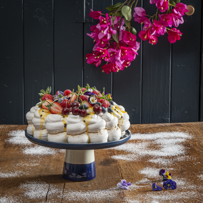 Festive-Pavlova-with-Cream-Berries-and-Passion-Fruit